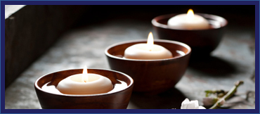 lit floating spa candles